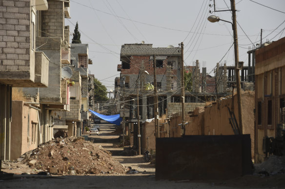 The town of Darbasiyah has been all but abandoned by citizens fearing a Turkish attack.
