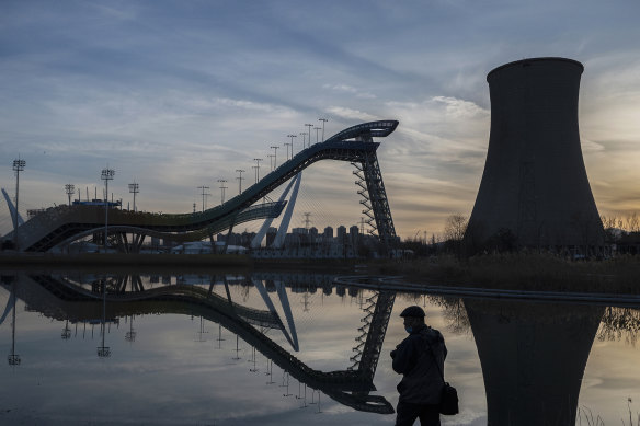 The Big Air venue, left, will host freestyle skiing events. The former power plant  in Shougang also houses the headquarters of the Beijing Olympics Organising Committee. 