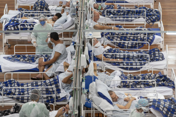 COVID-19 patients are treated in a field hospital built inside a gym in Santo Andre, on the outskirts of Sao Paulo, Brazil.