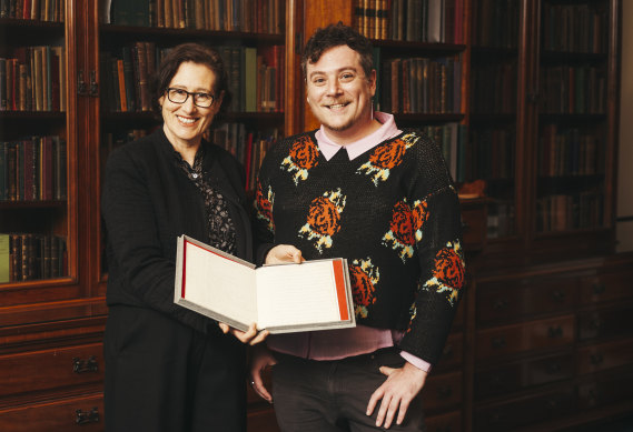 State Library of NSW senior curator Sally Hone and Indigenous Engagement branch manager Damien Webb with the newly acquired fragment of Governor Arthur Phillip’s long-lost journal.