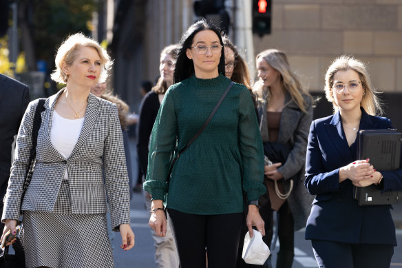 Patrice Turner (centre) arrives at the Victorian Supreme Court in 2023.