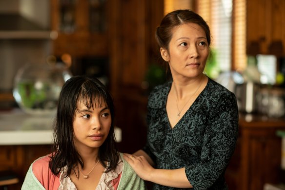 Jillian Nguyen as Sophie Tran (sitting) and Oakley Kwon as Diane Tran in 'Hungry Ghosts'.