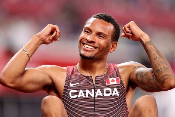 Andre de Grasse enjoys his win.
