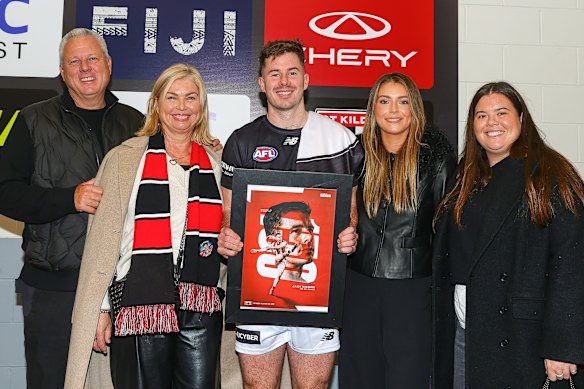 Jack Higgins celebrates his milestone with his family.