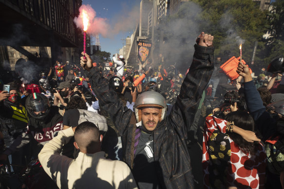 There was no social distancing when delivery workers gathered in Sao Paulo, Brazil on Wednesday to demand better conditions for those working for app-based food delivery platforms.