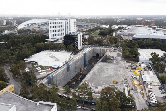 Excavators at work on the site of a train station at Sydney Olympic Park for the Metro West line.