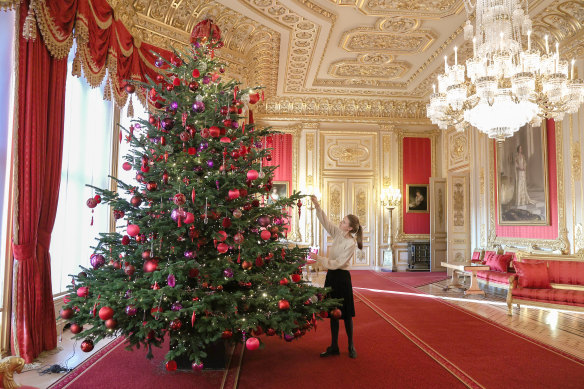 The 15-foot-high Christmas tree in the Crimson Drawing Room at Windsor Castle.
