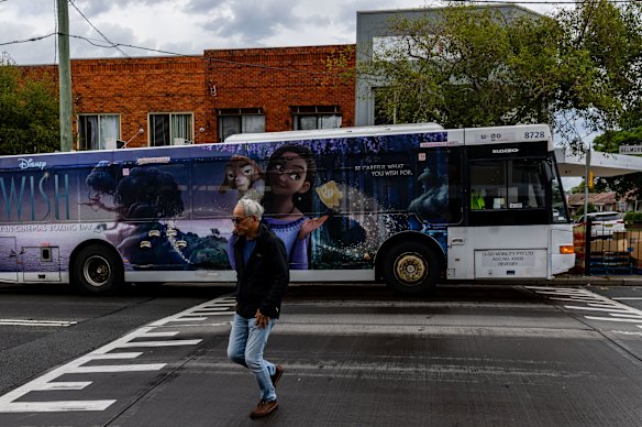 A pedestrian crosses at a speed hump in Riverwood.