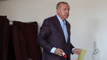 Turkey's President Recep Tayyip Erdogan casts his ballot in the re-run on SUnday.