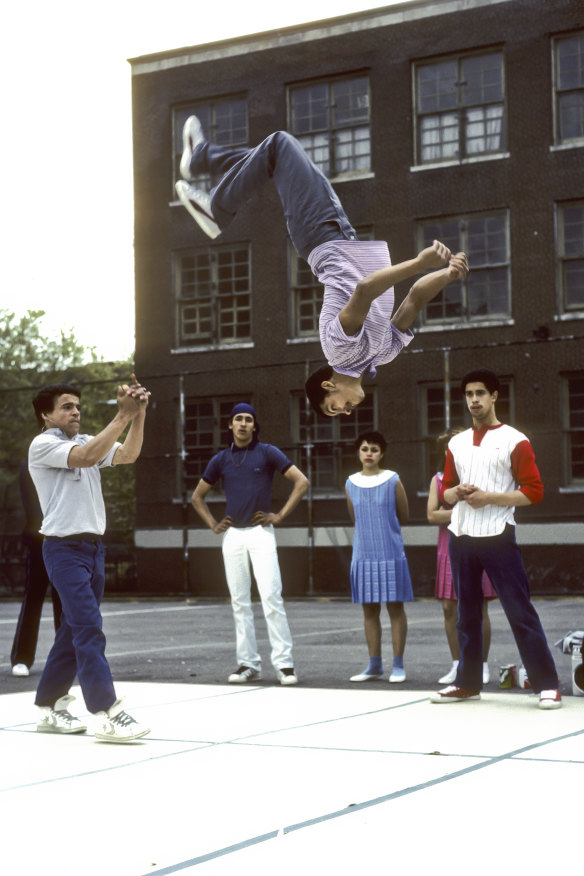 Members of the Rock Steady Crew breakdance at Booker T. Washington Junior High School in New York in 1983. 