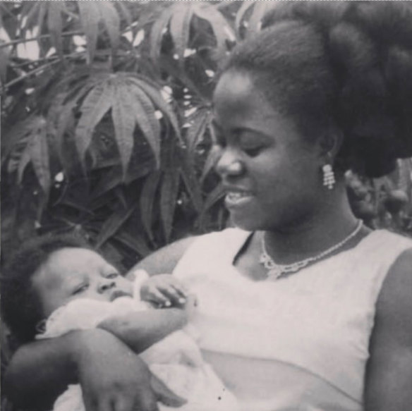 Enninful being held by his mother, Grace, in Takoradi, Ghana, in 1972.