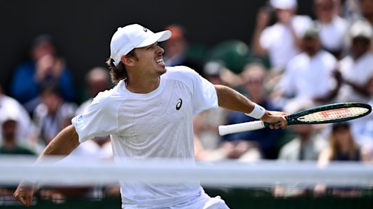 Alex De Minaur of Australia celebrates winning the third set against Arthur Cazaux of France.