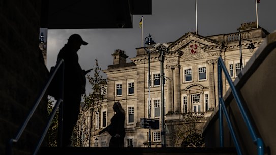 MAIDSTONE, ENGLAND - NOVEMBER 15: Members of the public opposite the Kent County Council offices on November 15, 2022 in Maidstone, England. Two tory run local authorities, Kent and Hampshire, have warned the PM, Rishi Sunak, that they may be forced to declare bankruptcy within the next months because of the current financial crisis. Soaring inflation and rising pressures in adult and children’s social care may force the councils to declare what is called a section 114 notice, which means that while existing key services would remain, no new non-essential spending would be authorised. (Photo by Dan Kitwood/Getty Images)