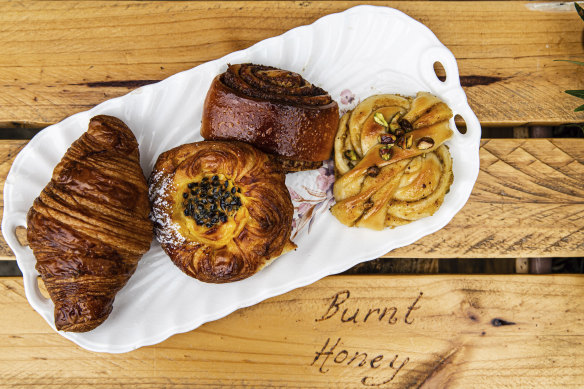 Croissant and pastries at bakery Burnt Honey in Long Jetty, NSW.