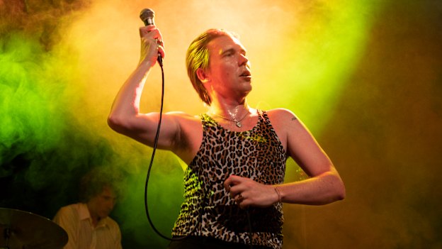 Alex Cameron performing in
Sydney in late 2022. “I write about the outlier, the table-for-one guy whose life is a constellation of microscopic tragedies.”