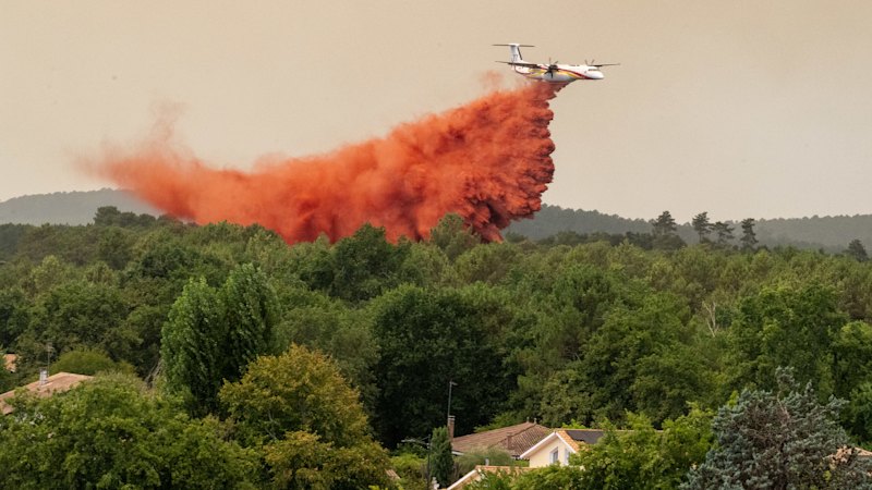 Tens of thousands forced to flee French holiday spot as fires spread across Europe