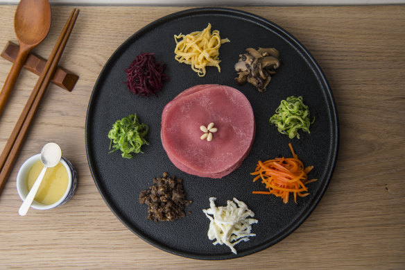 Gugeolpan wrap platter of 9 delicacies.