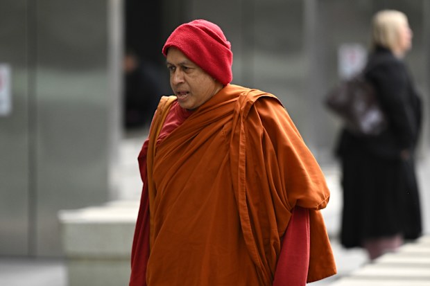 Naotunne Vijitha arrives to the County Court of Victoria in Melbourne, Wednesday, October 8, 2025. Openings expected in trial of 68-year-old Keysborough man Naotunne Vijitha, charged with a total of 19 offences relating to six alleged victims. He is the chief incumbant monk at a Keysborough Sri Lankan temple. (AAP Image/James Ross)