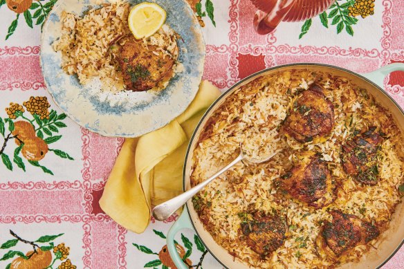Use lemon and oregano to marinate the chicken, then let the juices season the rice.