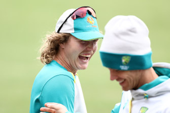 Will Pucovski shares a laugh with Tim Paine at training on Wednesday.