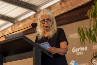 Professor Marcia Langton, who has helped craft a proposed model for the Indigenous Voice, speaks at the Garma Festival at Gulkula on Friday.