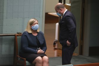 Liberal MP Bridget Archer in discussion with Treasurer Josh Frydenberg after she crossed the floor on Thursday.