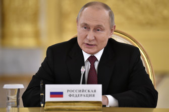 Russian President Vladimir Putin addresses a meeting at the Kremlin on Monday.