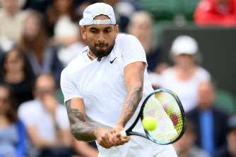 Nick Kyrgios plays a backhand against Serbia’s Filip Krajinovic at Wimbledon.