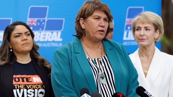 Kerrynne Liddle (centre) with Coalition senators Jacinta Price and Michaelia Cash.