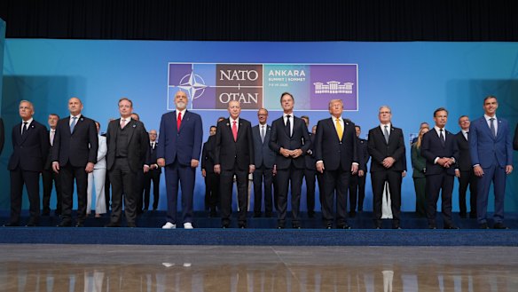 NATO leaders assemble for the traditional “family photo” in Ankara.