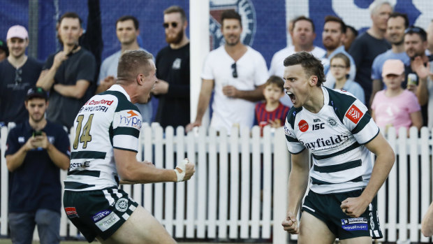 Derby delight: Warringah's Ben Woollett and Ben Marr celebrate a try during their win against Manly last weekend. 
