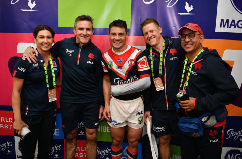Winning team: Cronk with the Roosters medical staff after the grand final.