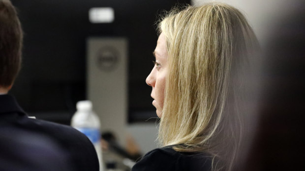 Fired Dallas police officer Amber Guyger listens as friends, family and coworkers speak in her defence during the sentencing phase of her murder trial.