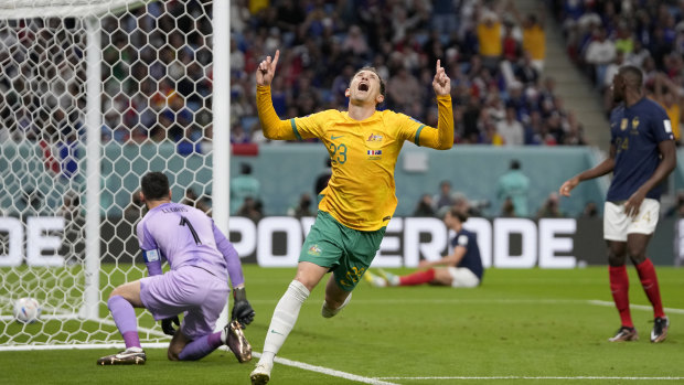 Australia’s Craig Goodwin celebrates after scoring against France.