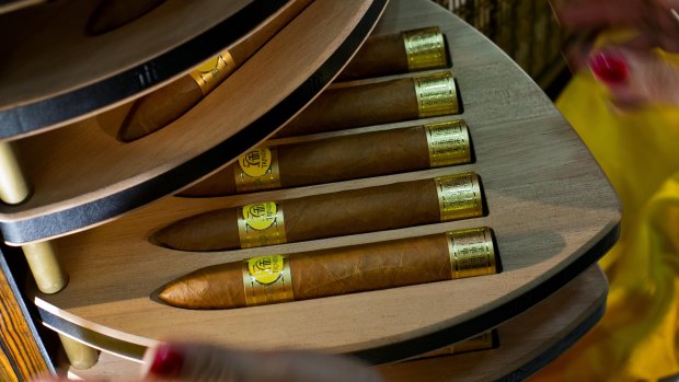 Trinidad cigars are displayed at the Cigar Festival in Havana, Cuba. US President Donald Trump has tightened import restriction on Cuban goods.