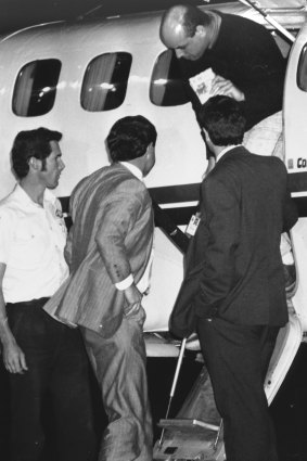 John Friedrich, former head of the Victorian branch of the NSCA, arrives at Essendon Airport after being extradited from Perth.