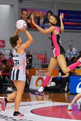Thunderbirds are go: Shamera Sterling attempts a spectacular block as Gabrielle Sinclair of the Magpies gets set for a shot.