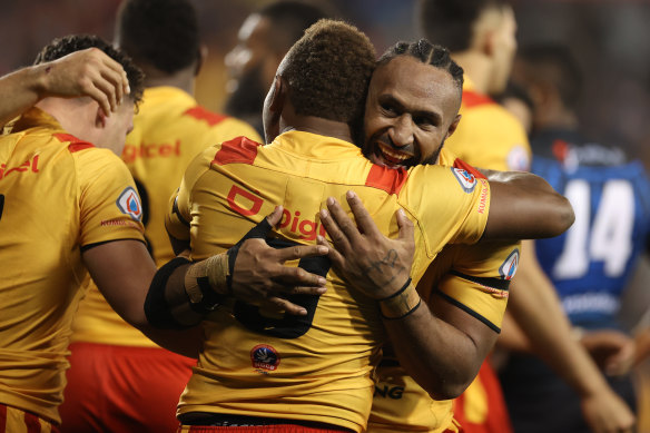 Justin Olam of Papua New Guinea celebrates during the Test against Fiji in Campbelltown last month.