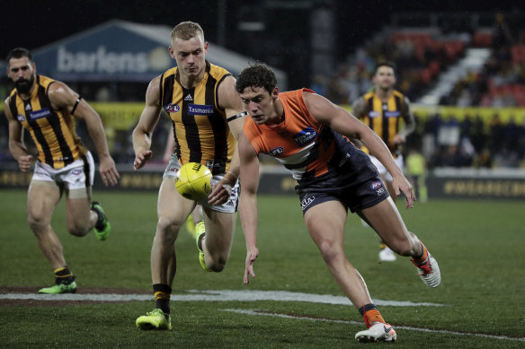 Jye Caldwell, right, in action for the Giants. 