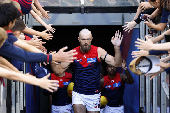 Max Gawn leads Melbourne out.