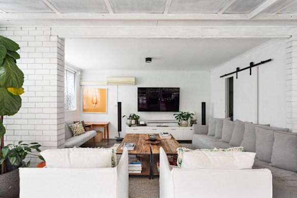 The five-bedroom, five-bathroom house has returned to the market with a $9 million guide.