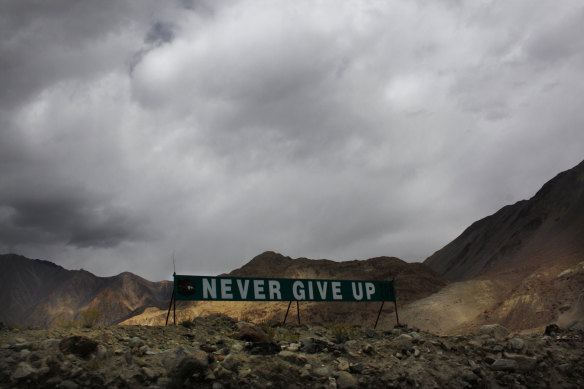 A banner erected by the Indian army stands near Pangong Tso lake near the India-China border in India’s Ladakh area in 2017. Indian and Chinese groups have disengaged thousands of forces in the mountains of the eastern Ladakh region.