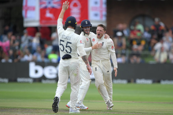 England's Dom Bess celebrates after taking the wicket of Rassie van der Dussen on day three of the Third Test against South Africa on Saturday.