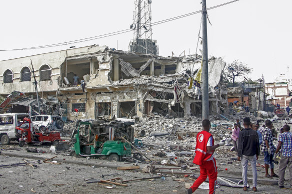 The explosions at a busy junction near key government offices left scores of civilian casualties.