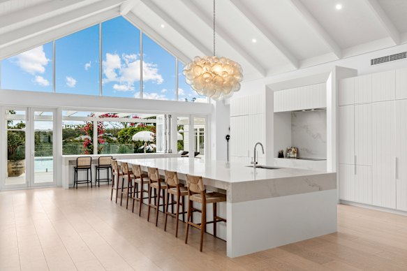 The home has six bedrooms and a tennis court. 