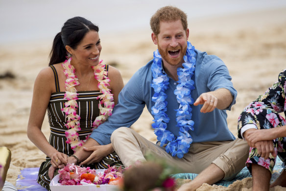 Meghan (pictured with Prince Harry at Bondi on their 2018 Australian tour) was a hit with the Australian public ... but trouble lay ahead.