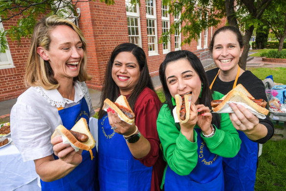 Camberwell South Primary School parents Morgan Lacey, Payal Chauhan, Lyuda Moon and Katie McNeill getting ready for election day on Thursday.