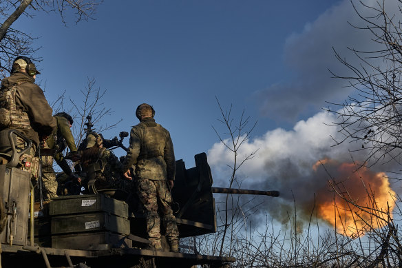 Members of Ukraine’s 56th Brigade fire an anti-aircraft gun in the Bakhmut District of Ukraine. 