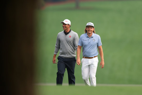 Adam Scott and Cameron Smith enjoy a laugh during a practice round at Augusta.