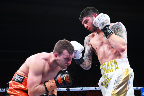 Duck and cover: Michael Zerafa lands a punch on Jeff Horn during their middleweight bout in Bendigo. 